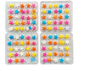 Assorted star-shaped candy in clear packaging on a light purple background
